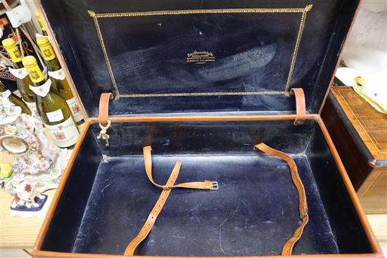 A vintage leather suitcase by John Pound & Co, Regent Street